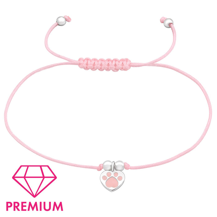 Joy|S - Zilveren hartje bedel armband - kat hond dieren poot bedel sterling zilver 925 - roze koord - poot afdruk