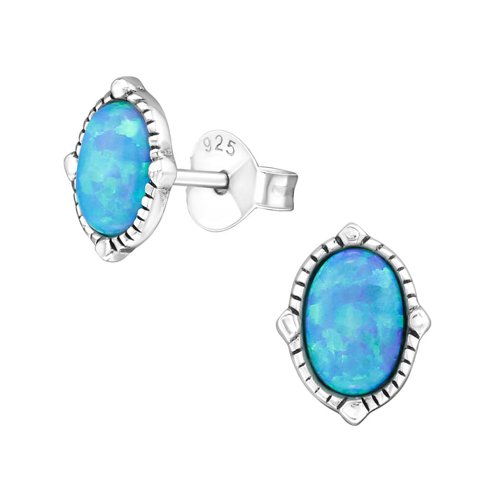 Joy|S - Zilveren elegante ovaal oorbellen - klassiek ovale oorknoppen met opaal - azure blauw - 7 x 8 mm - geoxideerd
