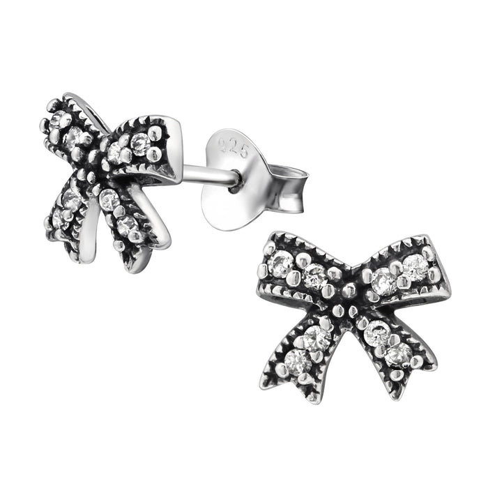 Joy|S - Zilveren strikje oorbellen - 9 x 8 mm - zirkonia - geoxideerd