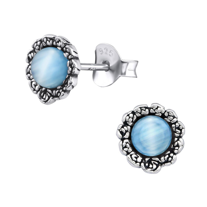 Joy|S - Zilveren bloem oorbellen - blauw chalcedony - 7 mm - geoxideerd